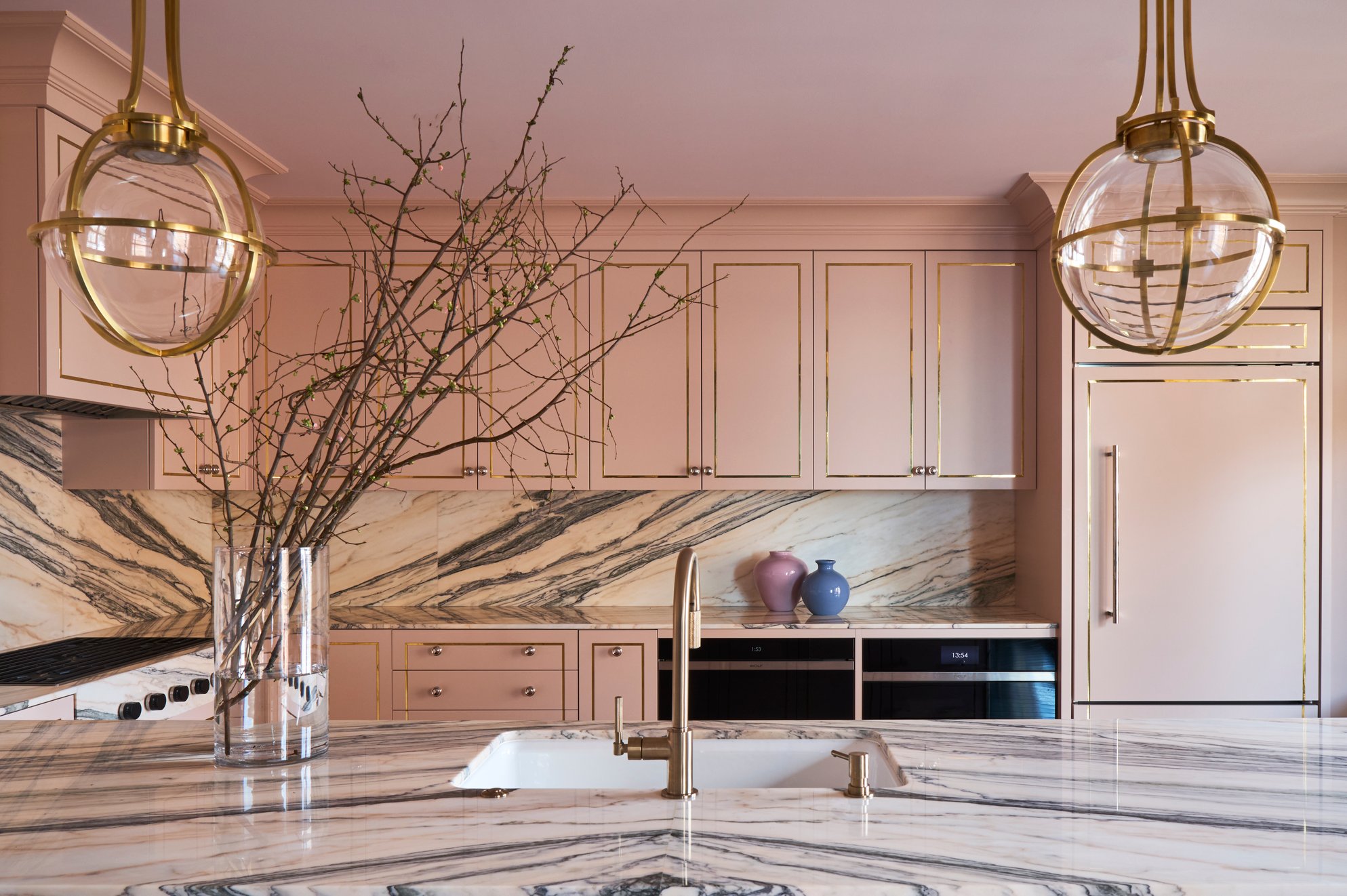 Brass Inlaid Blush Cabinets