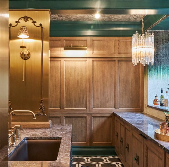 A view of a galley-style bar kitchen in a bar area in a home - interior design by Jasmin Reese Interiors, Chicago, USA. 