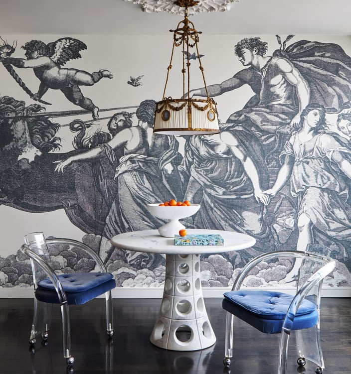 A small dinette with a scene from Greek mythology in a dining room designed by Jasmin Reese, Chicago. 