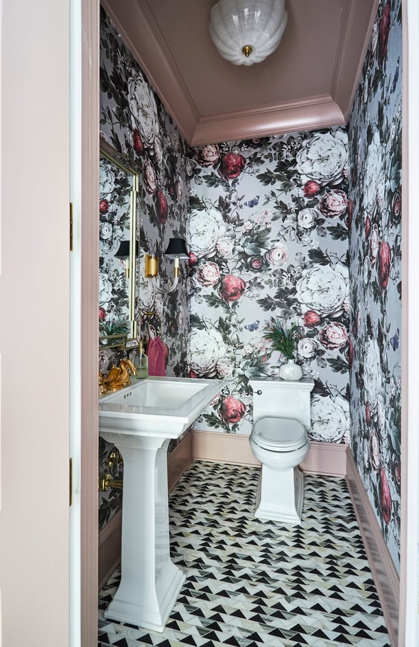 A metallic peach & black powder room designed by Jasmin Reese with foil floral wallpaper, Chicago. 