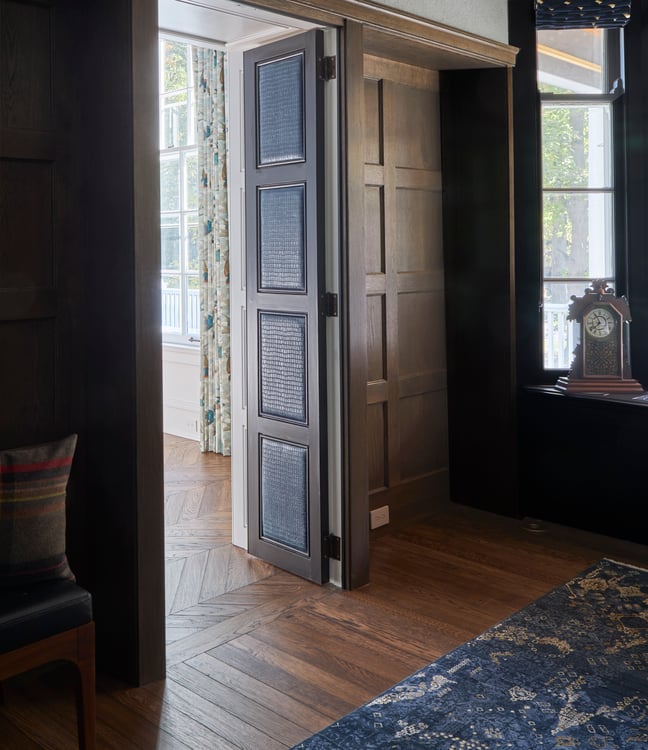 Oak walls, floors, and doors in a large study designed by Jasmin Reese Interiors, Chicago. 