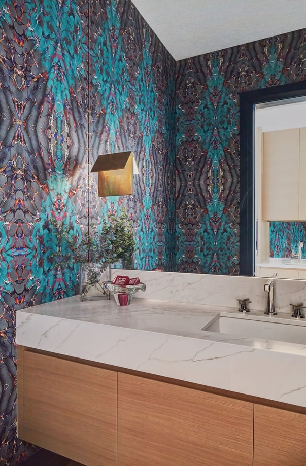 A modern marble & wood sink vanity with kaleidoscope wallpaper - bathroom design by Jasmin Reese, Chicago.