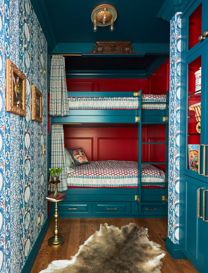 A bunk room for children designed with turquoise and red accents - interior design by Jasmin Reese Interiors, Chicago, USA. 