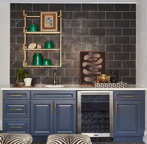 Wet bar designed by Jasmin Reese: marble subway tile, blue cabinetry, mini fridge, Chicago. 