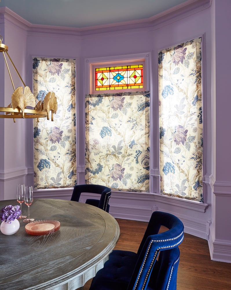 A dining room designed by Jasmin Reese in colors of lavender and bright blue, Chicago. 