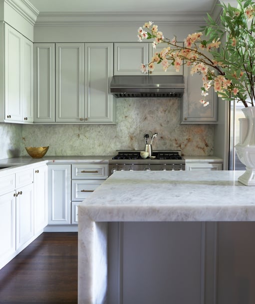A kitchen designed by Jasmin Reese with marble and white, Chicago. 