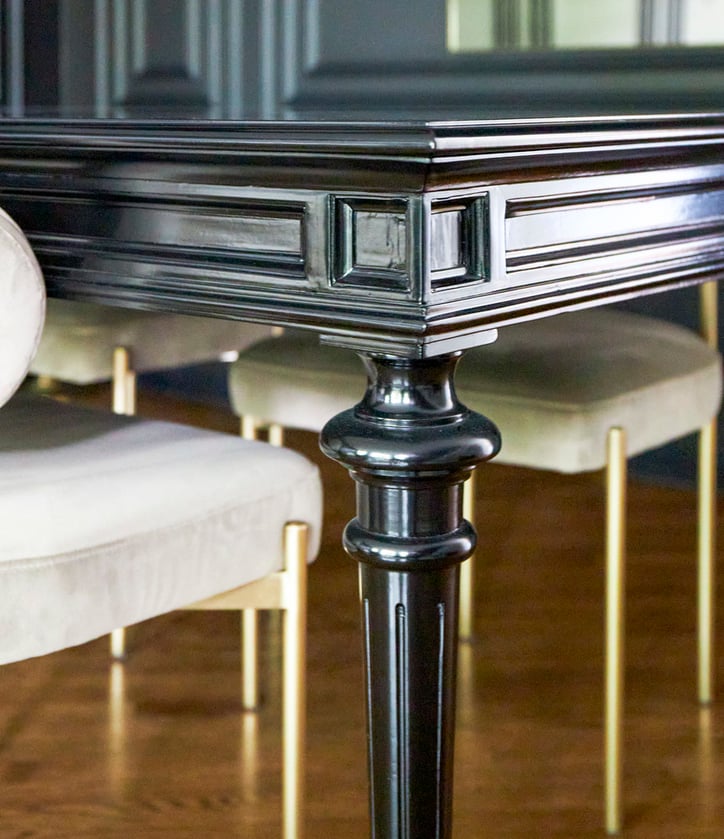 Detail of a black wood & enamel dining room table used by Jasmin Reese in an interior design, Chicago. 