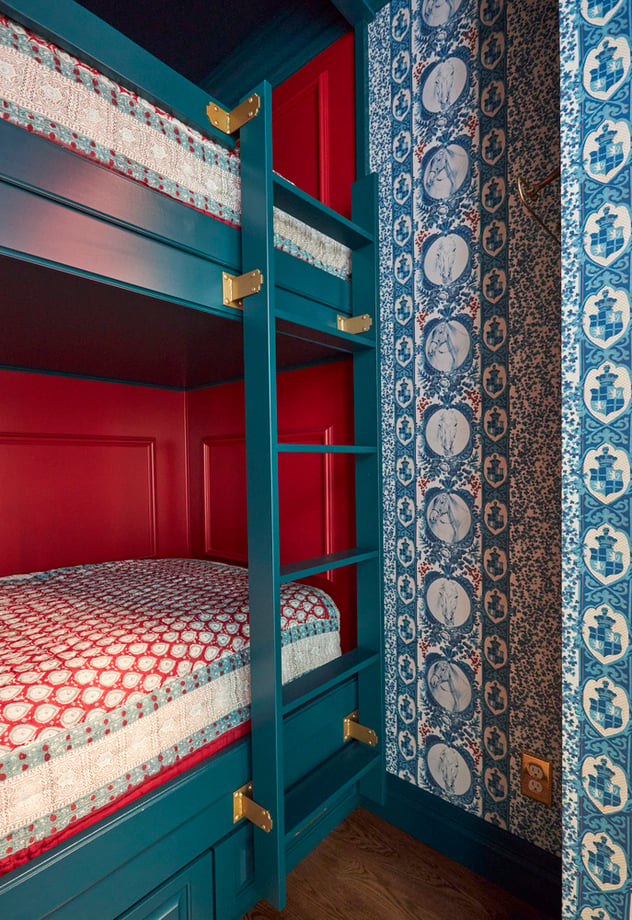 Detail of the hardware on the ladder in a bunk room for children designed with turquoise and red accents - interior design by Jasmin Reese Interiors, Chicago, USA.