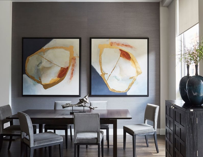 Chic dining room designed by Jasmin Reese: large abstract paintings, gray velvet chairs, Chicago. 